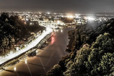 High angle view of illuminated cityscape at night