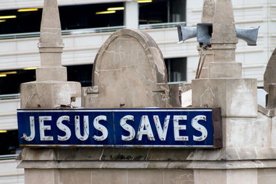 Sign on the roof of a church in downtown houston, texas