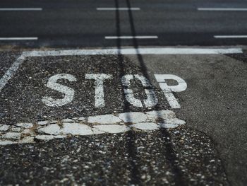 High angle view of text on road