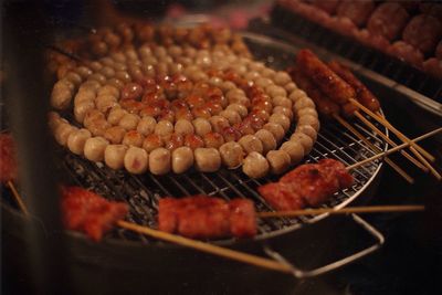 Close-up of meat on barbecue grill