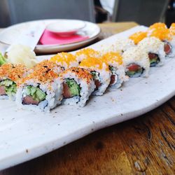 Close-up of sushi served on table