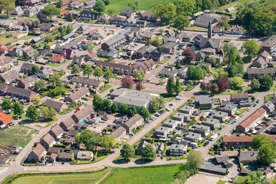 High angle view of houses and buildings in city