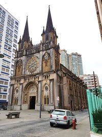 View of cathedral and buildings against clear sky