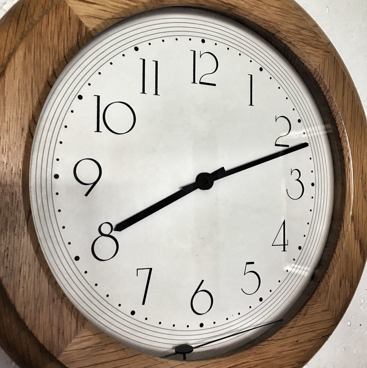 CLOSE-UP OF CLOCK ON WOOD