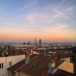 High angle view of cityscape against sky during sunset