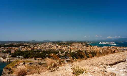 Cityscape against blue sky