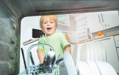 Portrait of young woman in car