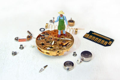 High angle view of toys on table against white background