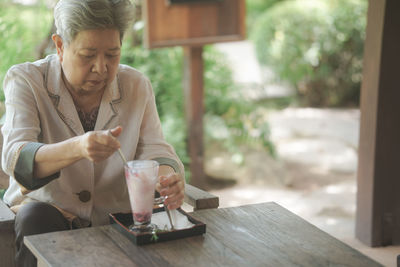 Young woman using mobile phone