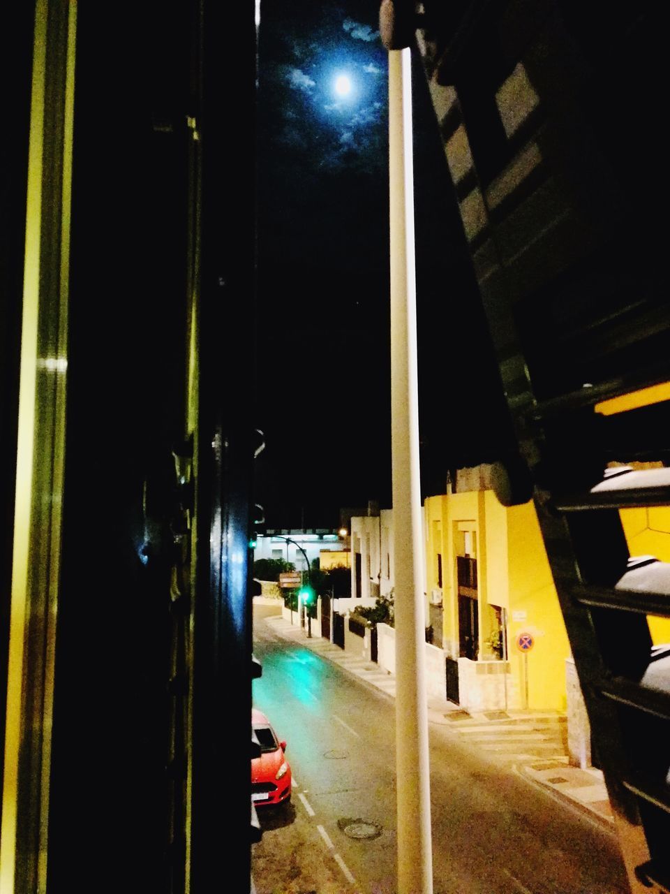 ILLUMINATED ROAD AT NIGHT