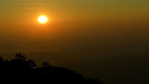 Scenic view of sunset over landscape