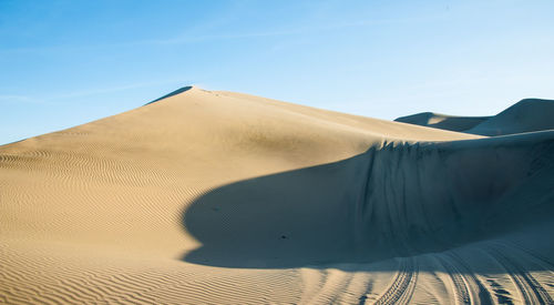 Scenic view of desert against sky