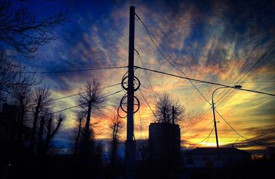 Silhouette of building at sunset