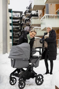 Female couple walking together at winter