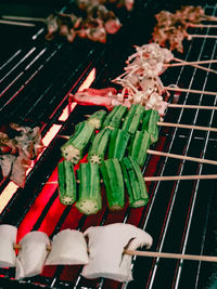 High angle view of meat on barbecue grill