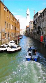 Boats moored at waterfront