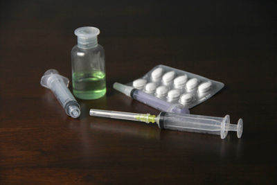 Close-up of bottles on table