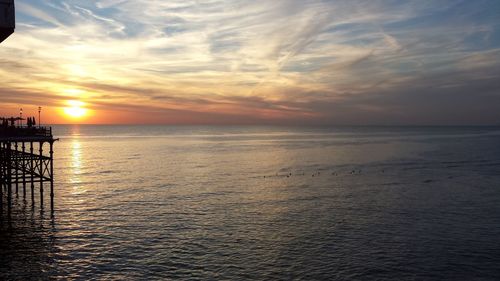 Scenic view of sea at sunset