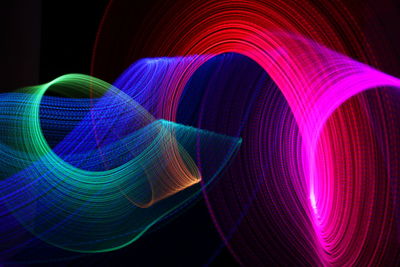 Abstract image of light painting over black background