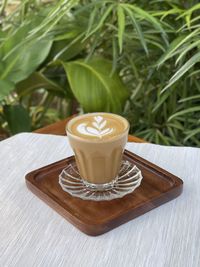 Close-up of coffee cup on table