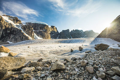 Rocks on shore against sky