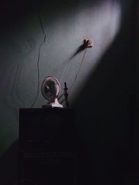 Low angle view of illuminated lighting equipment