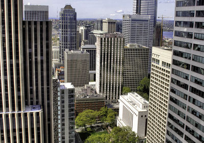 Modern buildings in city against sky