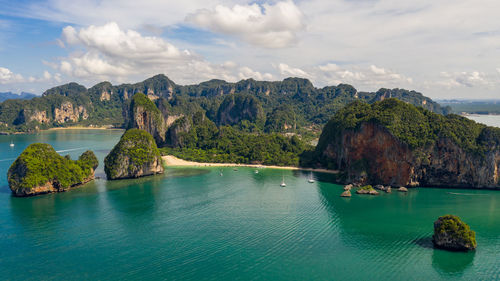 Amazing thailand high season beautiful seascape aerial view ao nang beach island and long tail boat