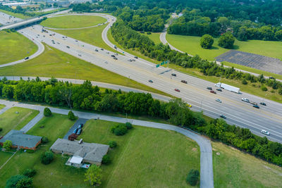 High angle view of road amidst field