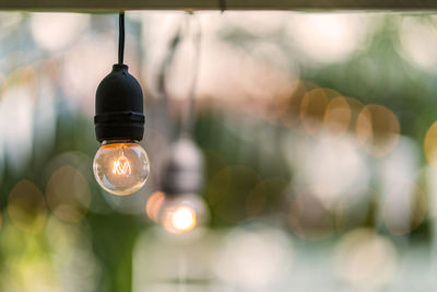 Close-up of illuminated light bulb