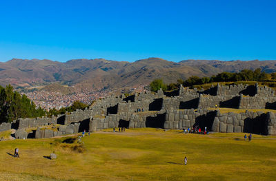 Scenic view of landscape against clear blue sky