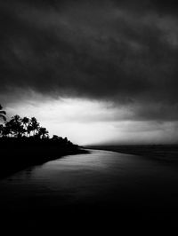 Scenic view of sea against sky at dusk