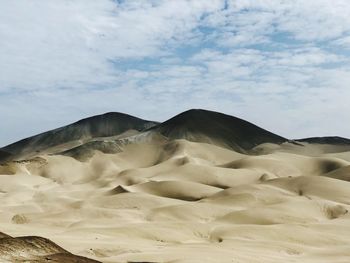 Scenic view of volcanic landscape against sky