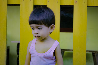 Portrait of cute girl looking at camera