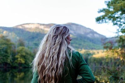 Young couple kissing in forest