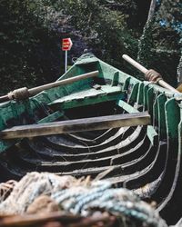 Close-up of old machinery on field