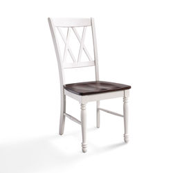 Empty chair on table against white background