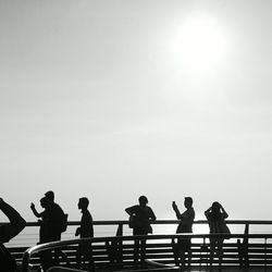 Friends standing on white background