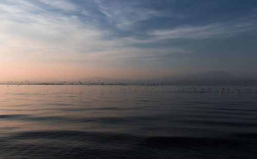 Scenic view of sea against sky during sunset