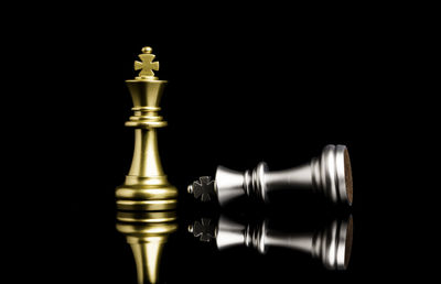 Close-up of chess against black background