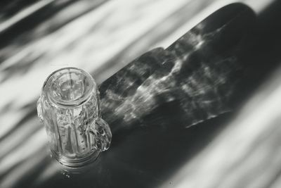 Close-up of glass jar on table