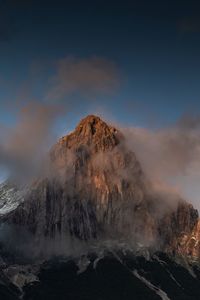 Panoramic view of volcanic mountain range against sky