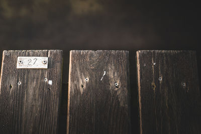 Close-up of text on wood