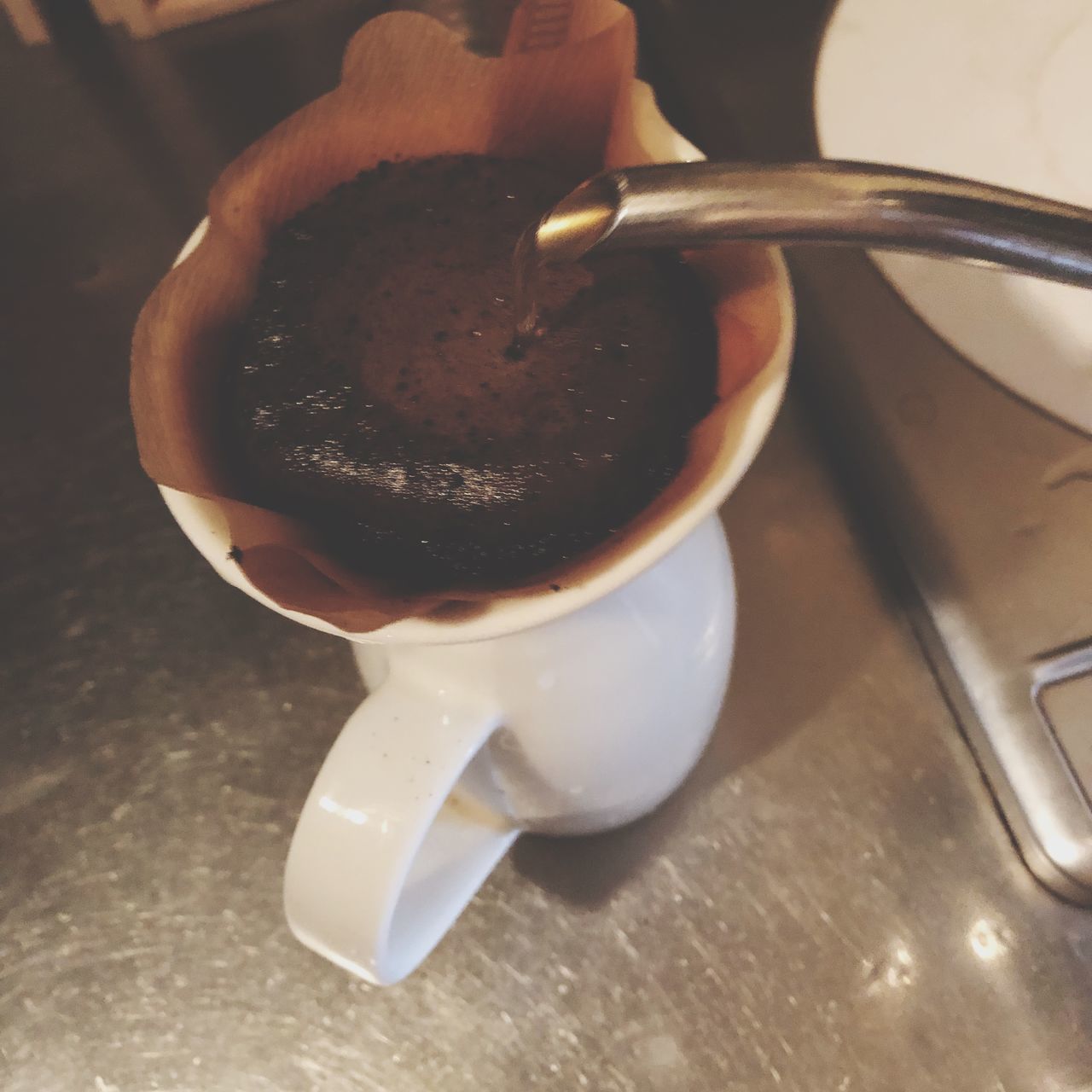 food and drink, food, table, indoors, drink, cup, close-up, freshness, coffee, kitchen utensil, eating utensil, spoon, mug, refreshment, high angle view, coffee cup, coffee - drink, still life, no people, focus on foreground, temptation, crockery