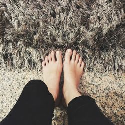 Low section of woman with bare feet