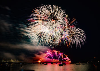 Firework display at night