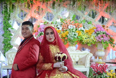 Portrait of a smiling young couple