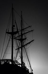 Low angle view of mast against sky