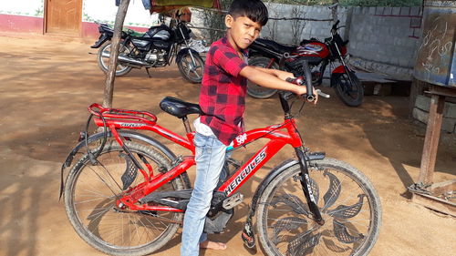 Boy riding bicycle