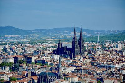 Clermont-ferrand cathedral with cityscape against sky